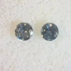 .63 TWCT. MATCHING PAIR, ROUND CUT 4MM MONTANA SAPPHIRES