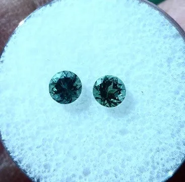 .80 TCW. LIGHT TEAL COLOR SET OF SAPPHIRES 4.1 MM. ROUND