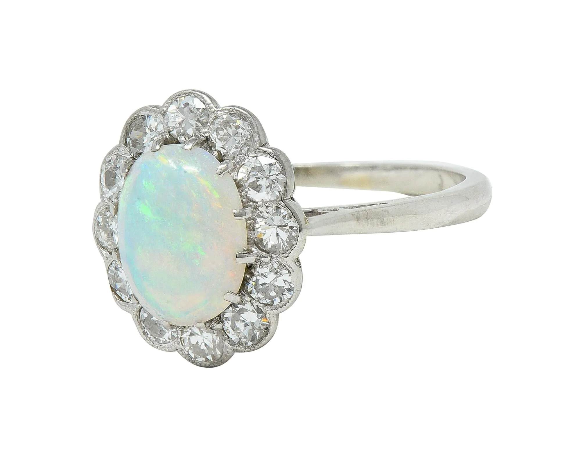 Edwardian 0.60 CTW Opal Diamond Platinum 18 Karat Gold Antique Halo Ring