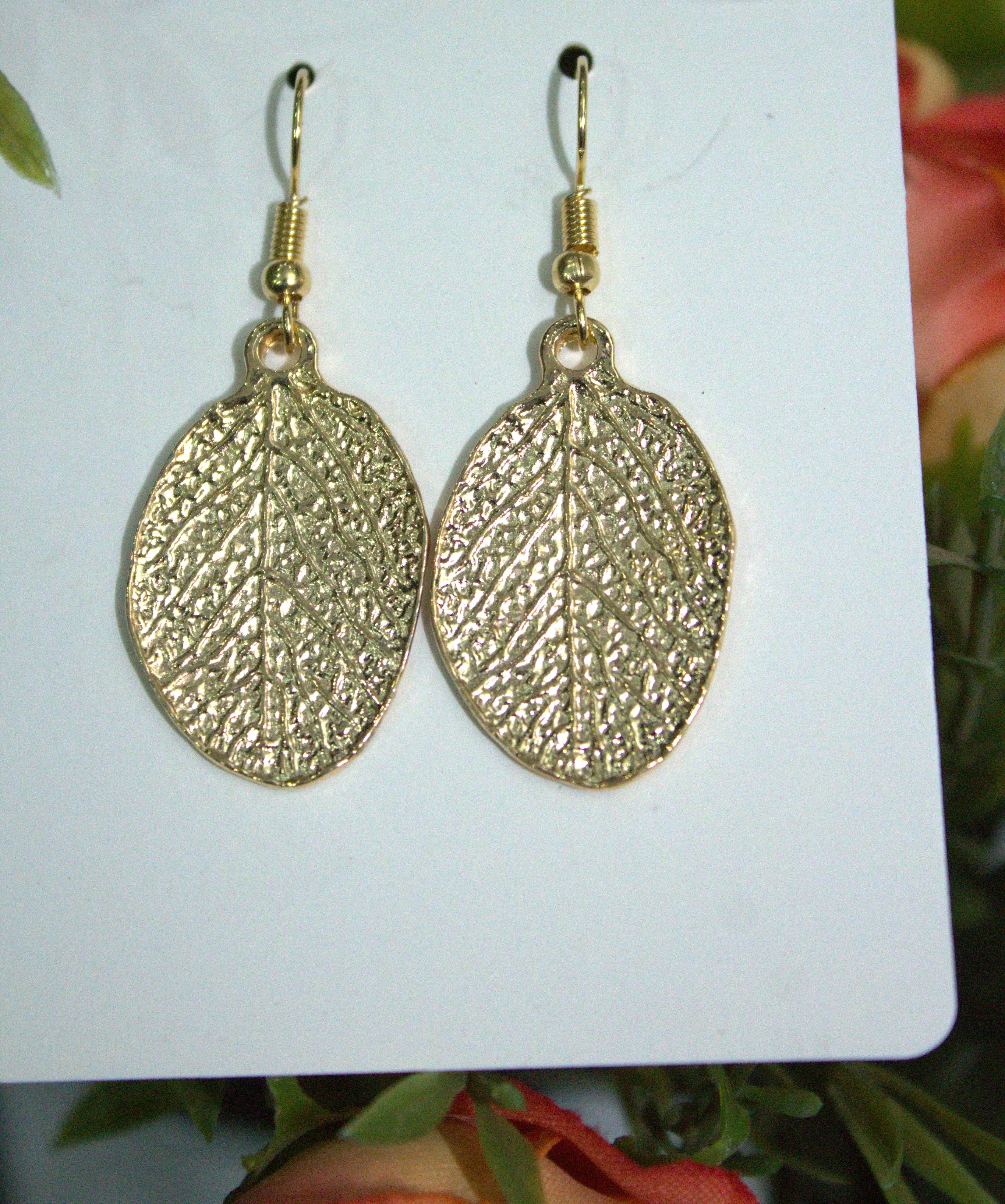 Gold single earring