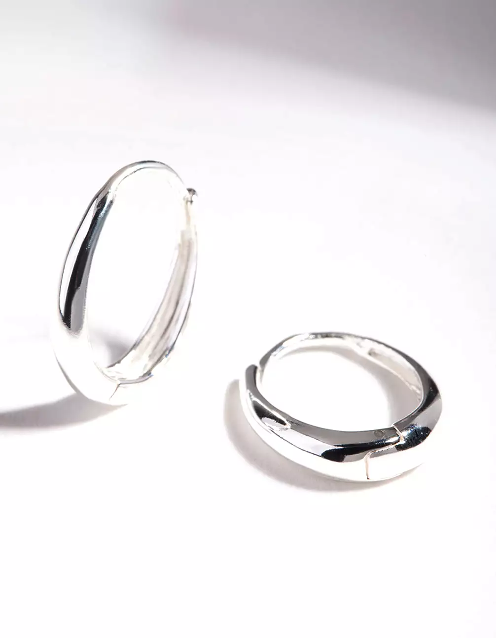 Sterling Silver Oval Drop Huggie Earrings