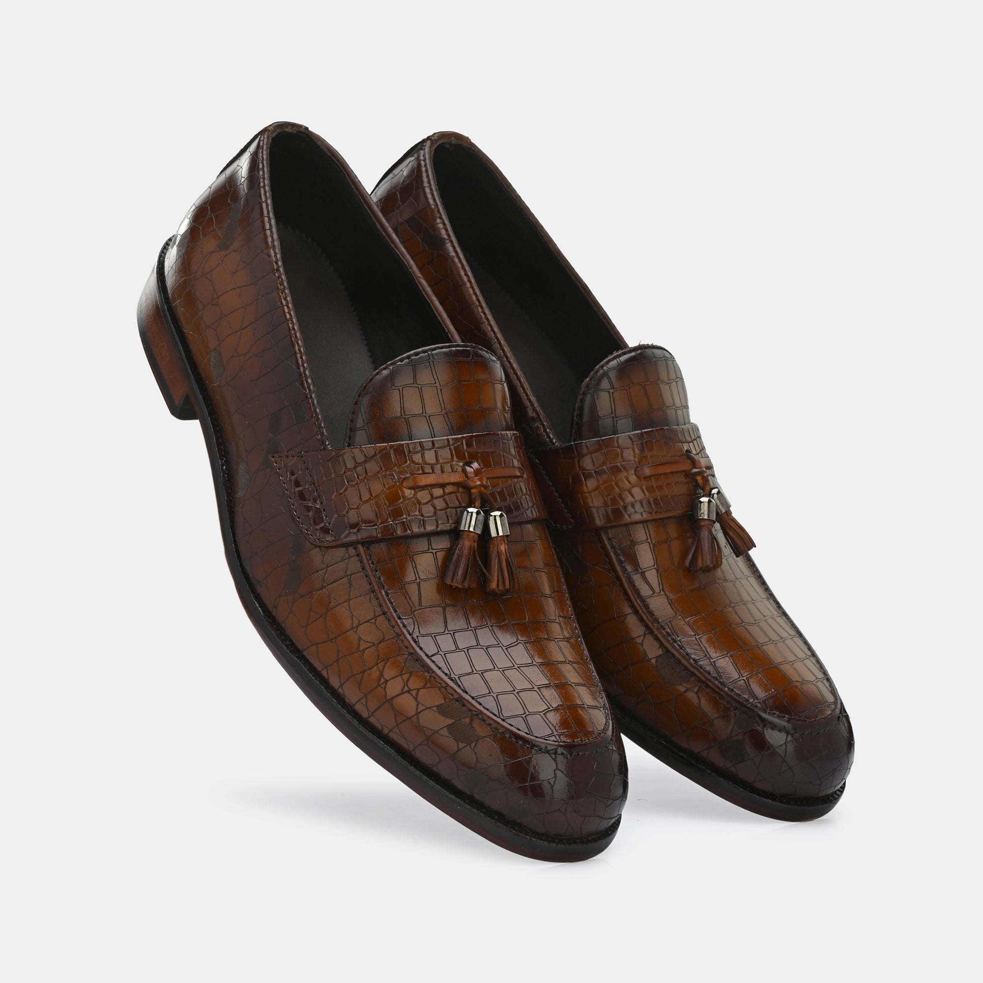 Tan Laser Engraved Tassel Loafers by Lafattio