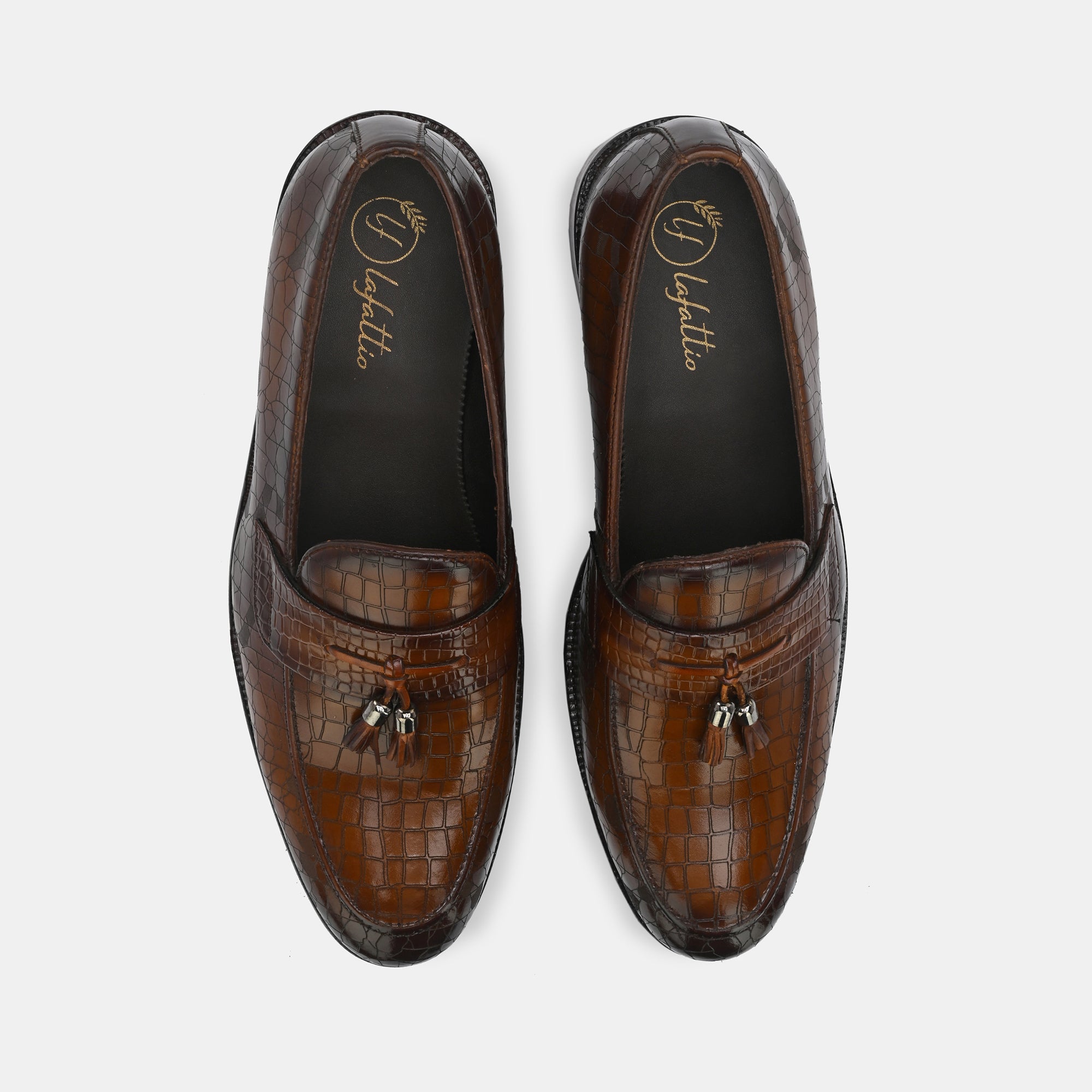 Tan Laser Engraved Tassel Loafers by Lafattio