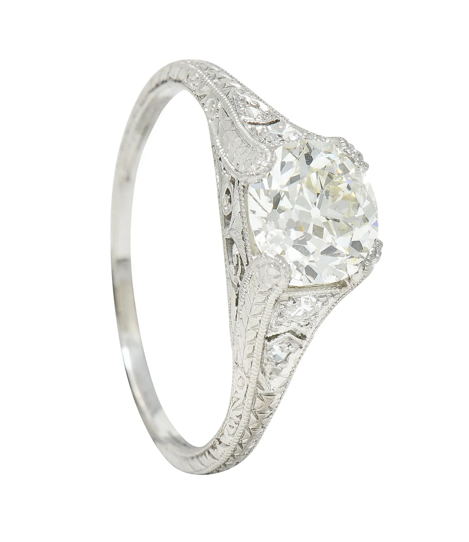 Wheeler & Co. Late Edwardian 1.48 CTW Diamond Platinum Engraved Antique Engagement Ring