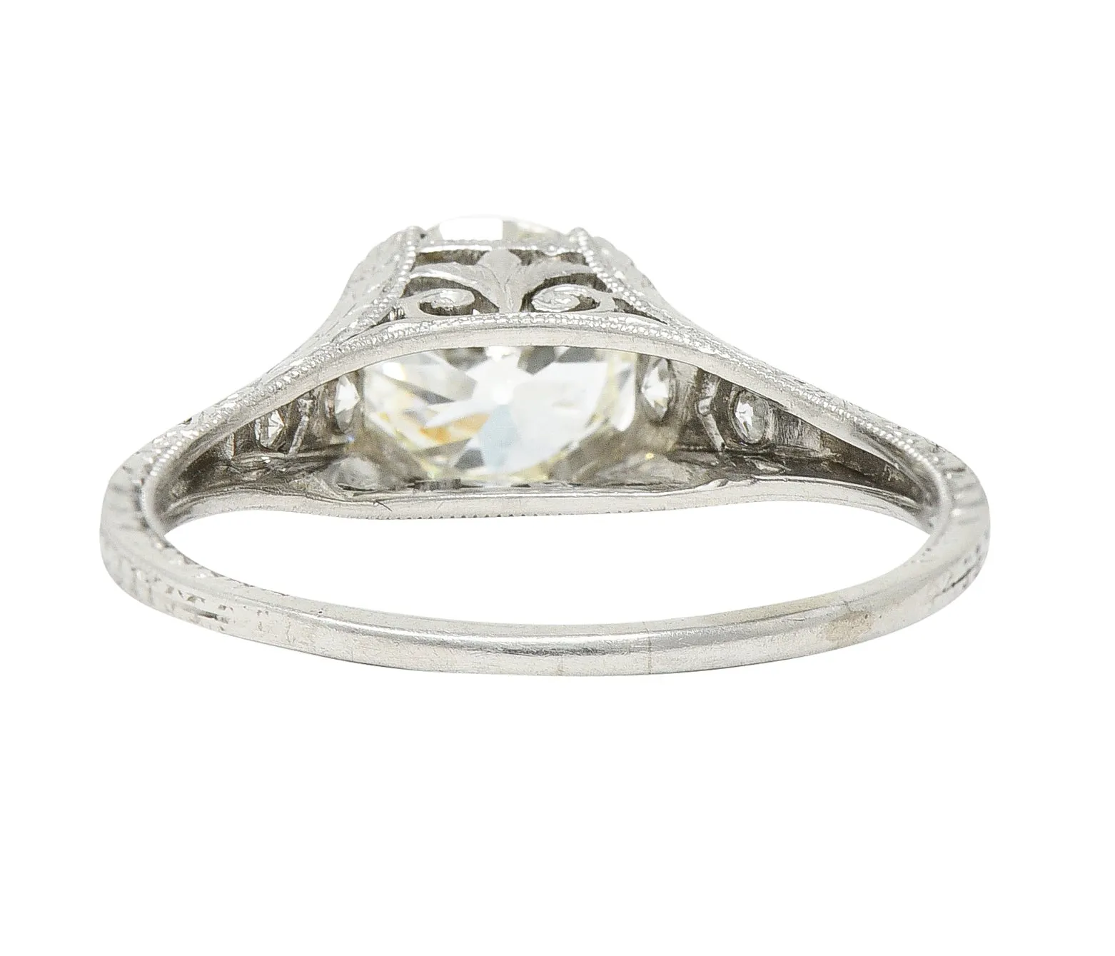 Wheeler & Co. Late Edwardian 1.48 CTW Diamond Platinum Engraved Antique Engagement Ring